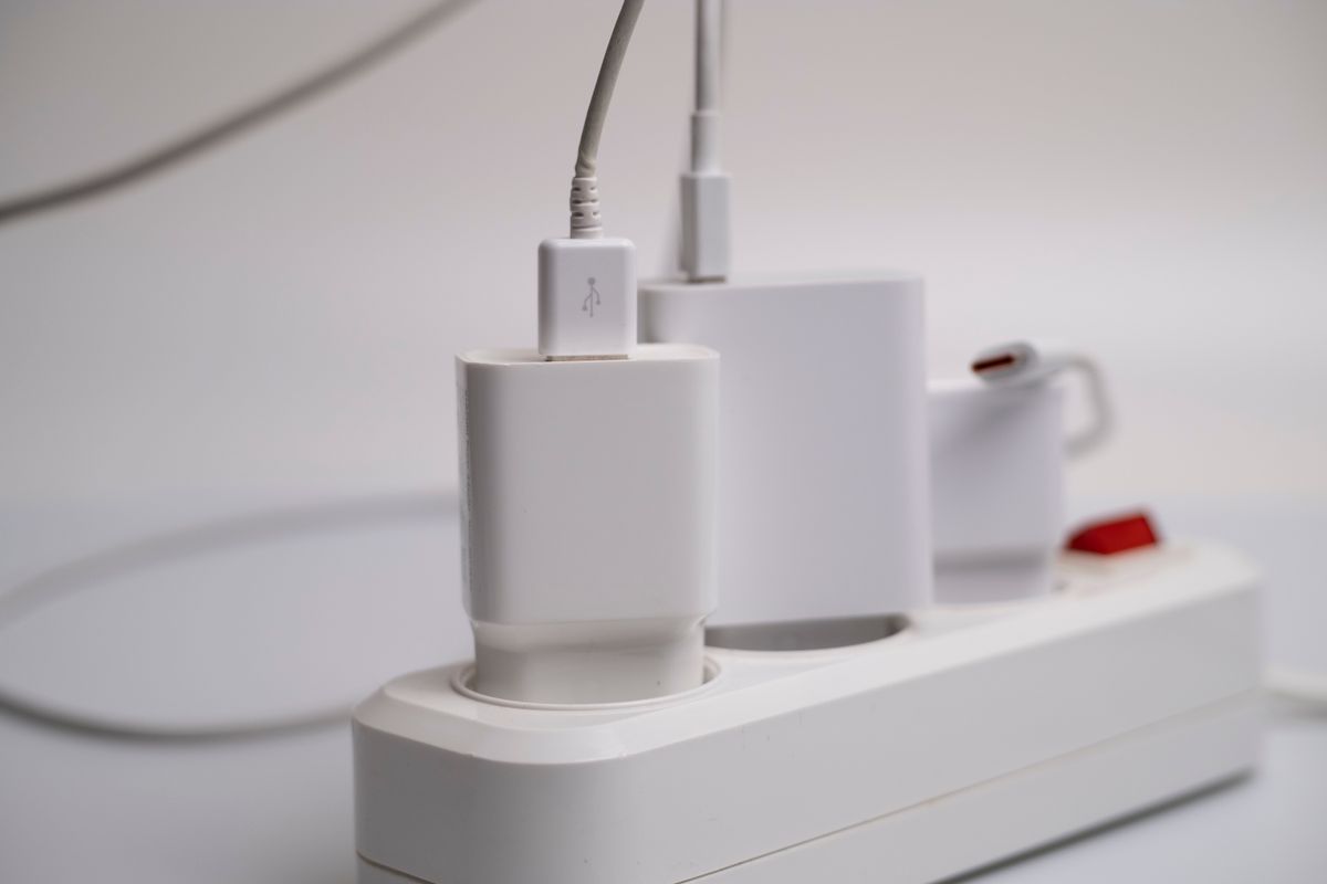 Chargers plugged into a power strip